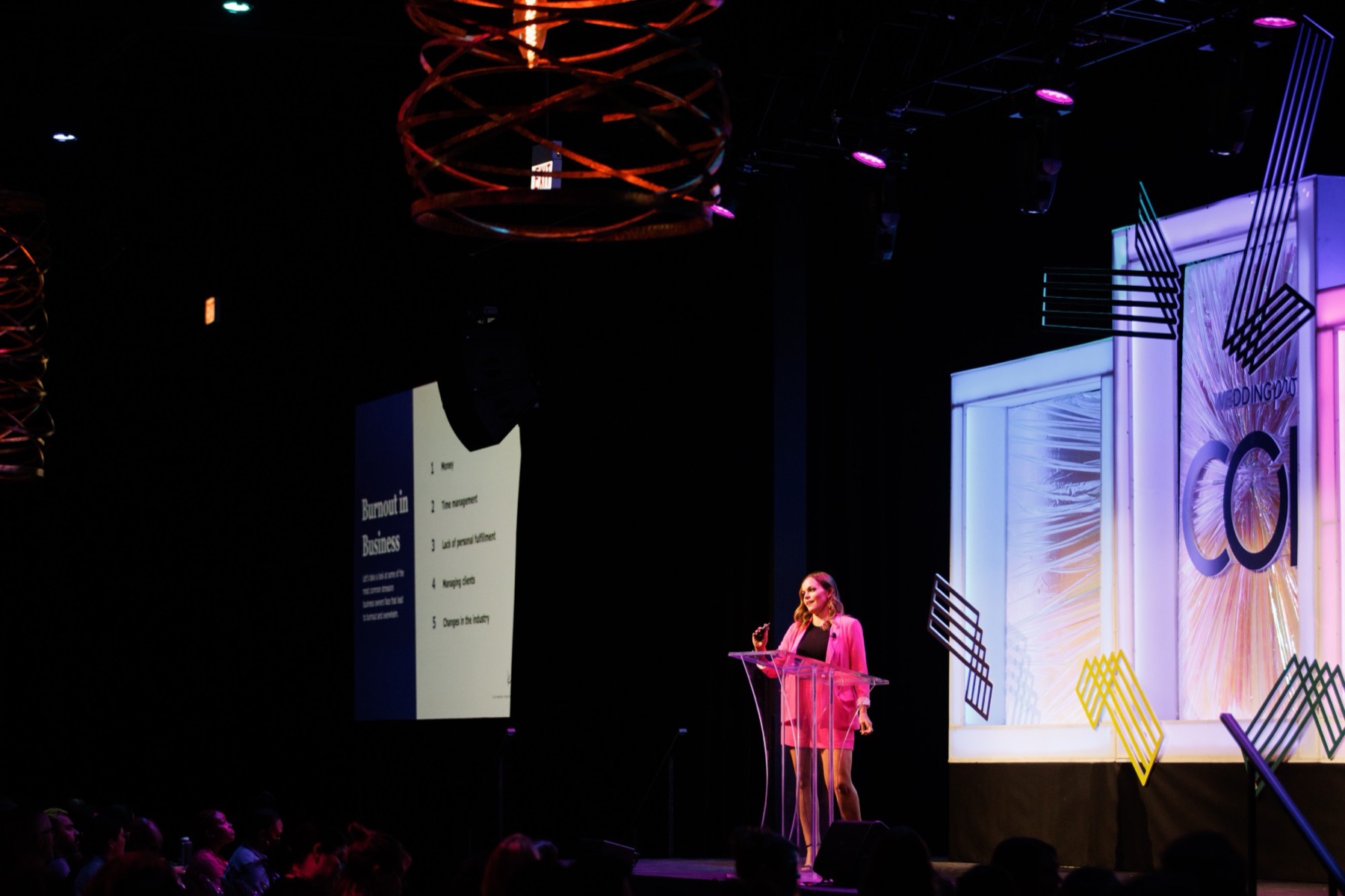 Stephanie speaking on stage